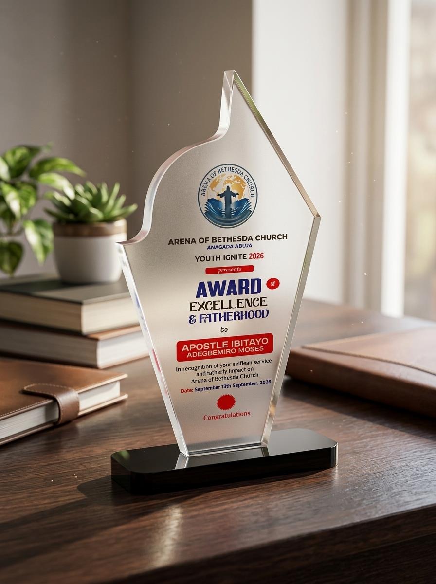 Branded award plaque displayed beside a bright window